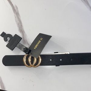 Black belt with golden buckle